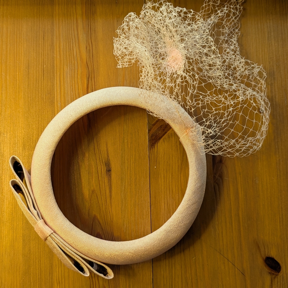 Elegant Cream Fascinator with Bow and Netting